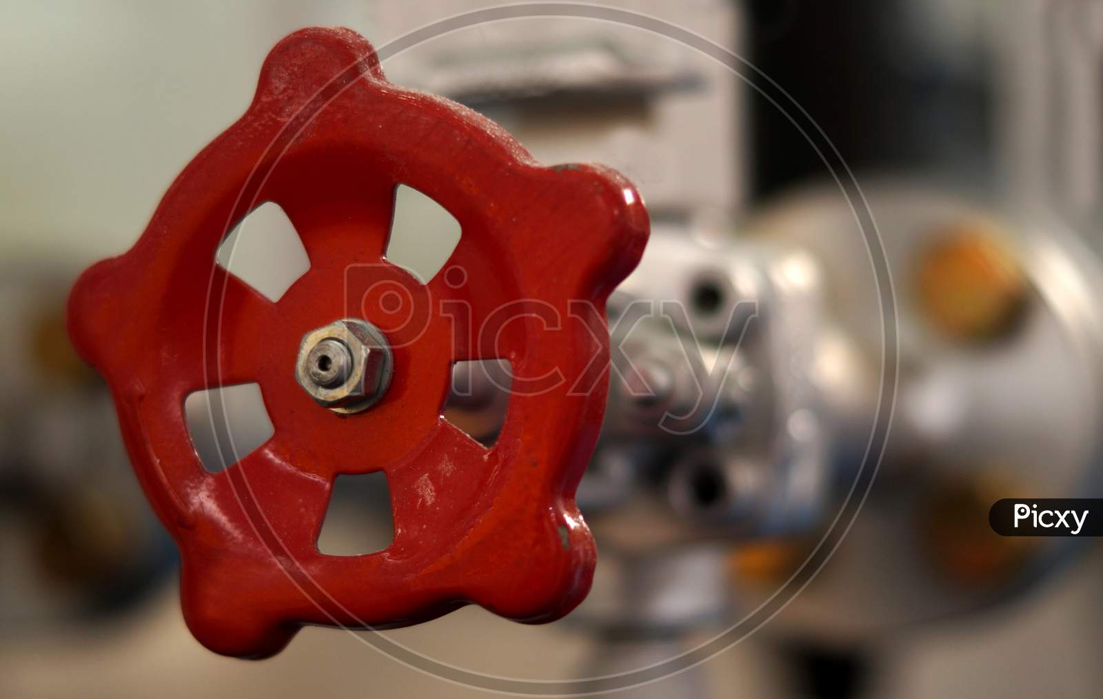 Circular Wheel Handle Control Mechanism Of A Motor In An Industry