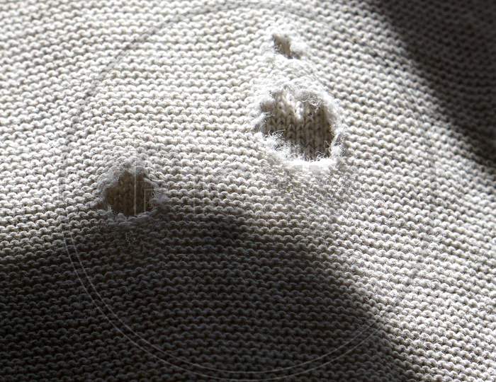 View Of Textile Material And Texture With Holes In Sunlight