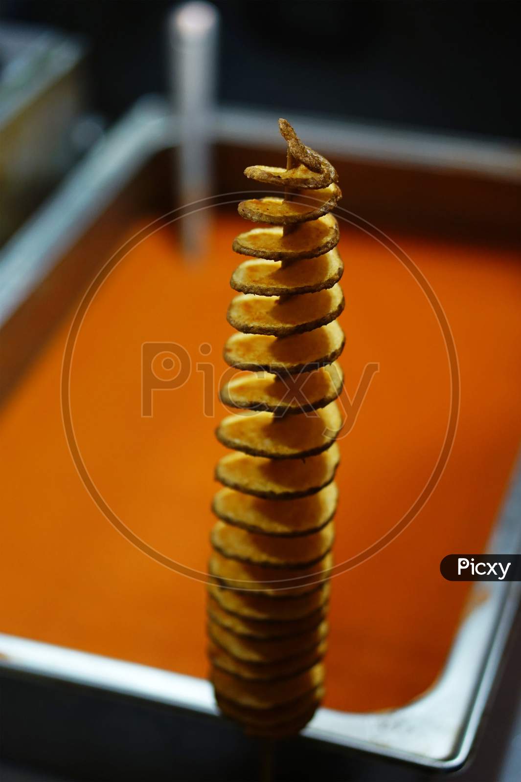 Indian Street Food Making Of Twisted Or Tornado Photo Chips