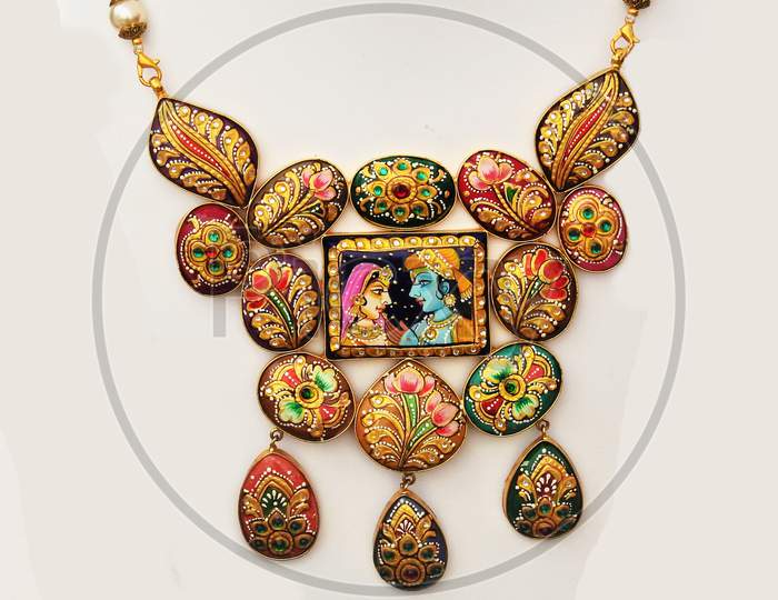 Indian Hindu Woman Jewelry Locket With Krishna And Radha Image On Locket Of Necklace