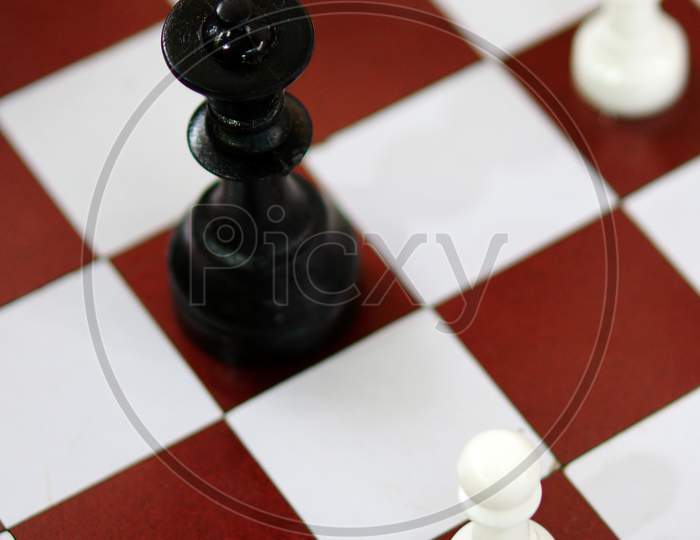 Chess Board Game With Pieces In The Squares