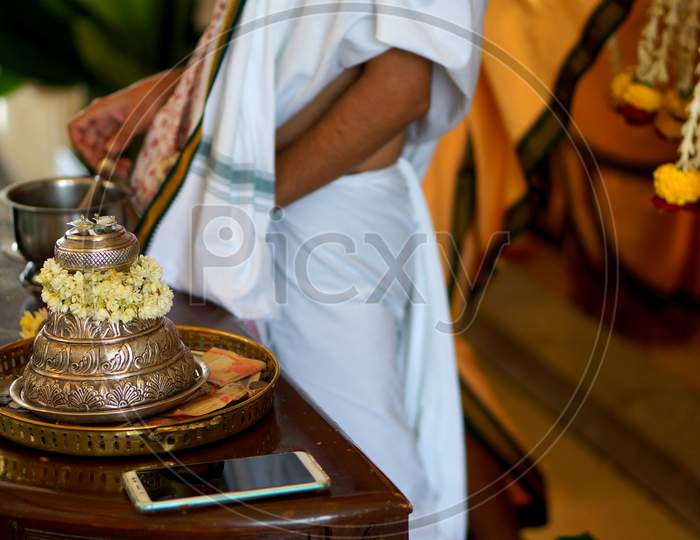 Satagopam In The Shape Of Silver Cap With  Feet Of Hindu God Vishnu,Symbolically,And Priest Touch Devotees Head As Blessing Of Deity In Temple