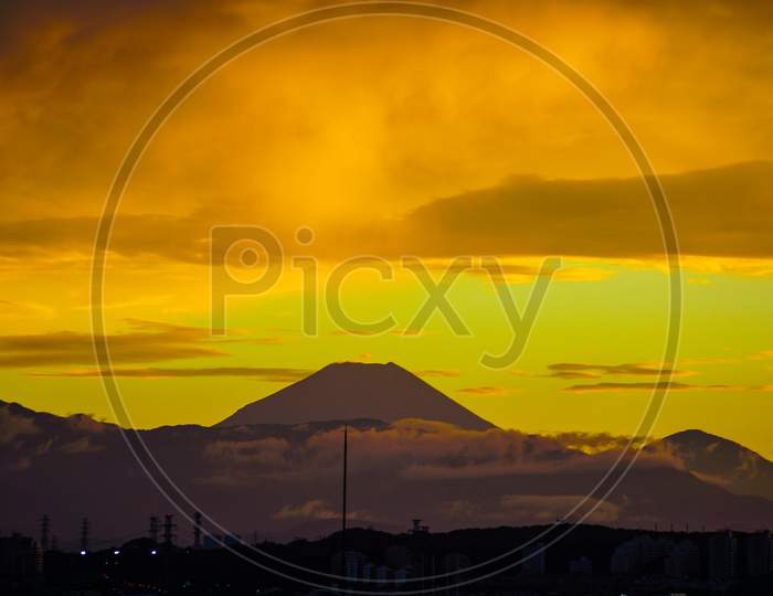 Fuji Of Silhouette That Is Wrapped In The Sunset