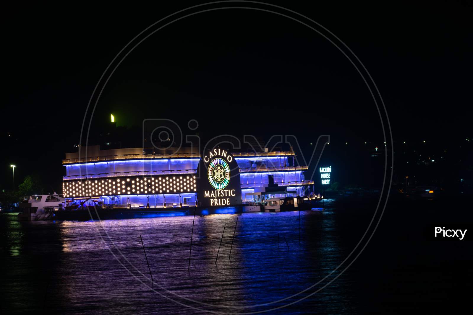 Panjim, Goa, India - 01 October 2021, Picture of Casino Majestic Pride cruise ship situated in Mandovi river which is tourist attraction for gambling, betting and entertainment.