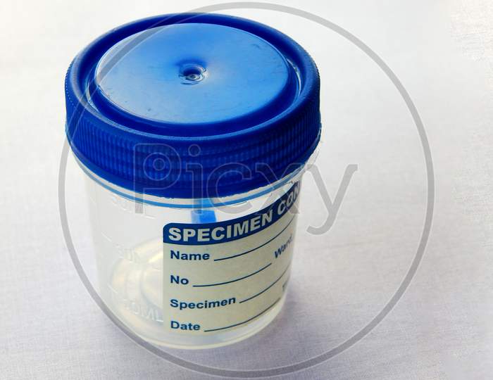 View Of  Empty Plastic Container For Taking Stool Or Feces Samples Of Patient In Pathology Laboratory