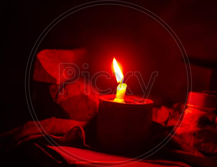 small candle light in the dark background