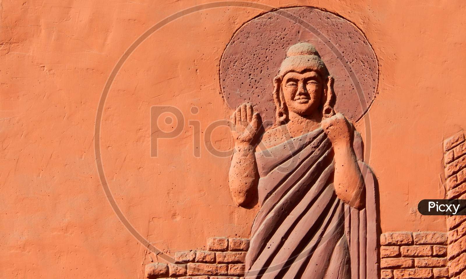 Image of View Of Hand Of Buddha Statue In Blessing Pose-LD783842-Picxy