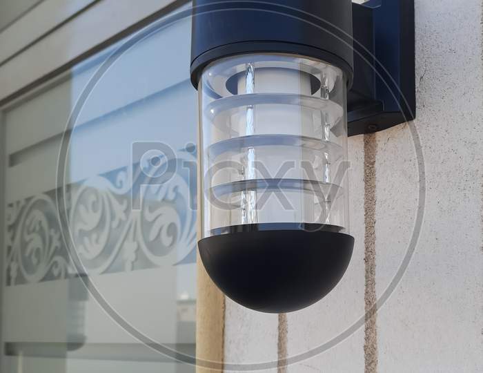 Beautiful exterior lamp hanging on the wall.