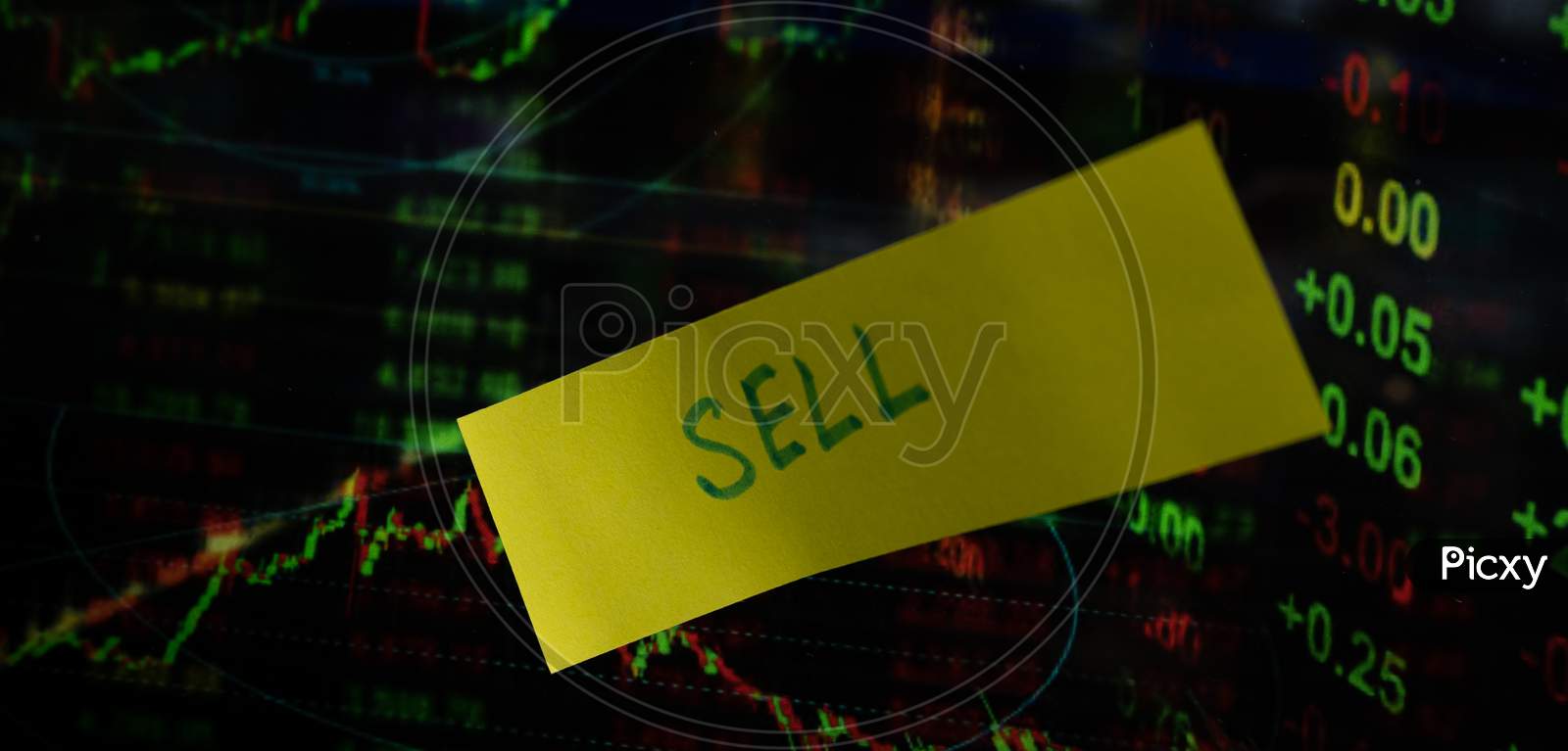 Concept Of Sell Written On Sticky Notes Attached On Share Market Graph.