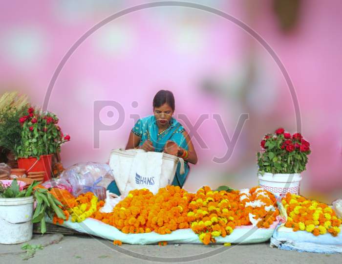 Women preparing shop for selling