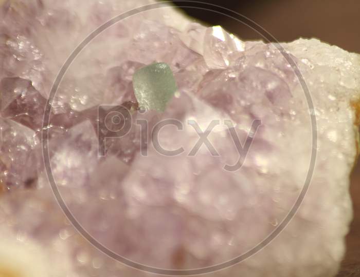 Closeup Of Sea Glass In Amethyst Rock