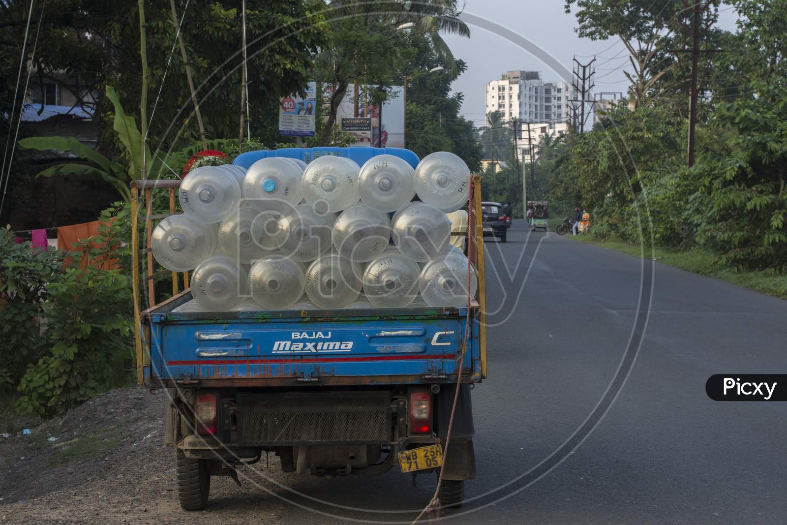 15Th October, 2021, Kolkata, West Bengal, India: A Motor Van Carrying Empty 20 Liters Package Drinking Water Jars With Selective Focus.