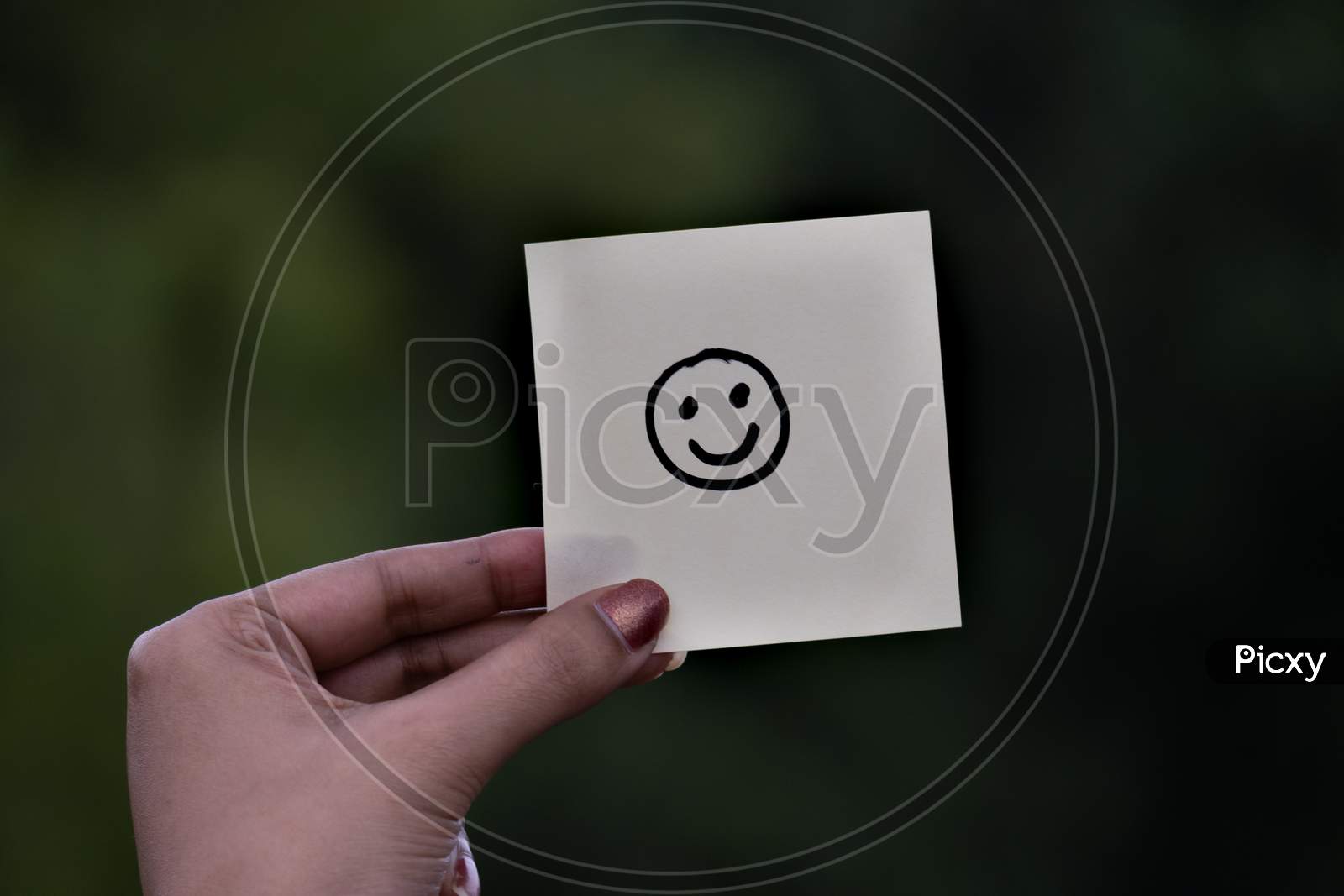 Emoji Or Drawing Of Happy Expression Face On Blank Note Pad Or Sticky Notes.