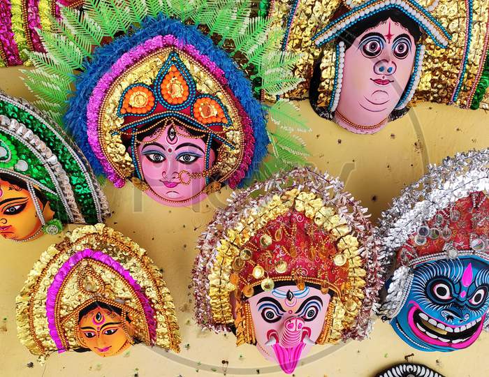Verious face masks of chhau dance being displayed for sale. Face masks of chhau dance, a traditional folk dance in purulia, west Bengal.