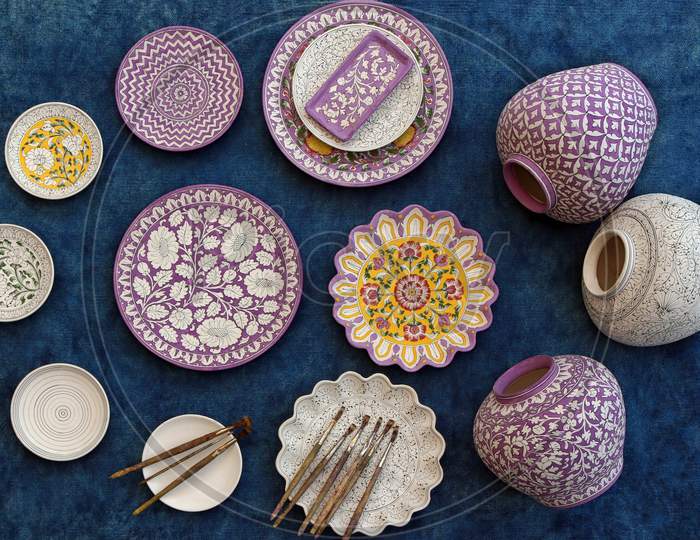 Process of Blue Pottery in Jaipur. Flat-lay blue pottery.
