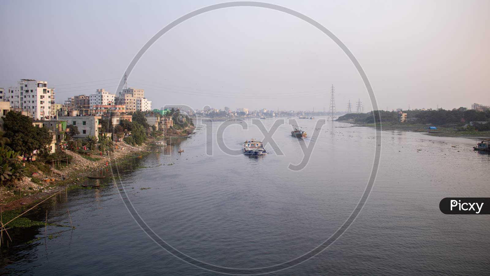 Picture Of Dhaka City On The Banks Of River Buriganga.The River Buriganga Has Enhanced The Beauty Of The Capital City Dhaka.