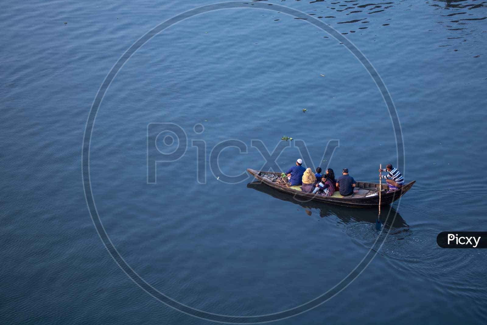 Everyone Is Taking A Boat Ride On The River Buriganga Near The Capital City.
