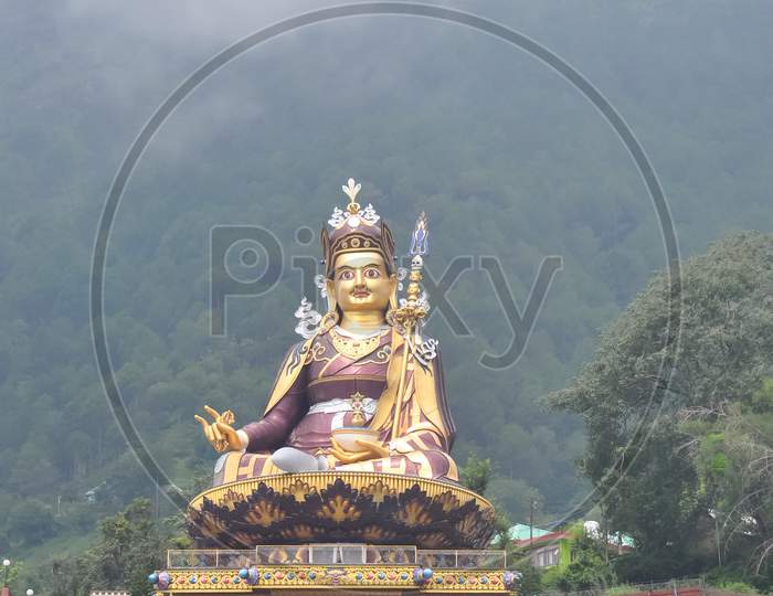 Beautiful view of giant statue of Padmasambhava (Guru Rinpoche) in Rewalsar lake (Tso Pema), Himachal Pradesh, India