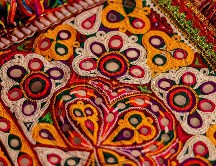 Mirrored Embroidery Work Typical Of The Aahir Tribe In Gujarat,India,Traditional And Pattern Art Embroidery Artwork Beautiful View, Handmade. Ethnic And Tribal Motifs.