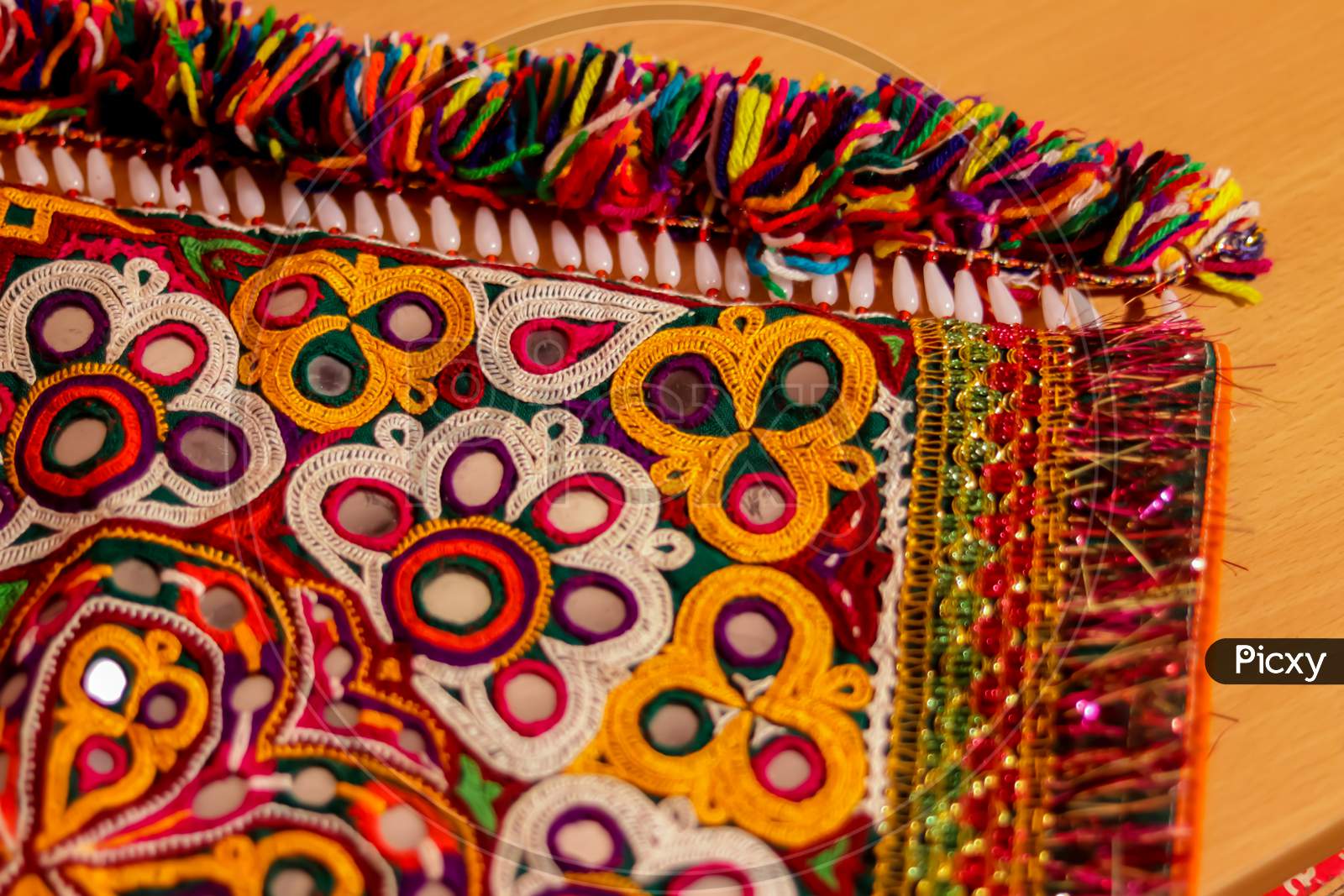 Beautiful View Of Colorful Ethnic Belts With Mirrors And Shells At Market In Rajasthan, India,Multicolour Ethnic Embroidery,Gujarat India Embroidery Craft Close Up View,Pakistan Embroidery