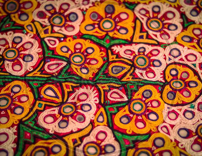 Mirrored Embroidery Work Typical Of The Aahir Tribe In Gujarat,India,Traditional And Pattern Art Embroidery Artwork Beautiful View, Handmade. Ethnic And Tribal Motifs.