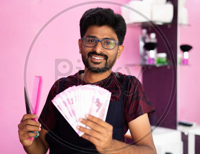 Happy Smiling Indian Barber With Currency Notes - Concept Of Successful Business, Profit Making, Banking And Finance.