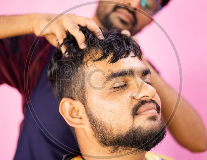 Customer At Barber Shop Enjoying Head Massage From Barber - Concept Of Relaxation And Alternative Health Treatment