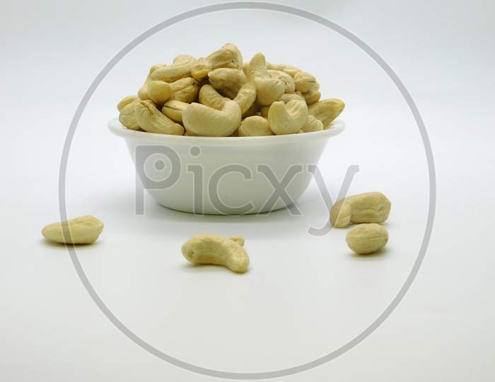 Cashew / Kaju In White Plate With Isolated White Background