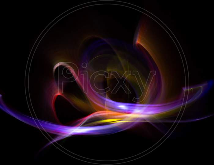 3D Illustration Or 3D Rendering. Colorful Abstract Lights Effects On Black Background. Light Painting Technique.