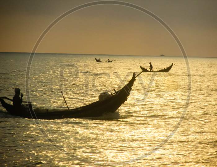 Fishing Boat At Sunset In Quang Tri, Vietnam