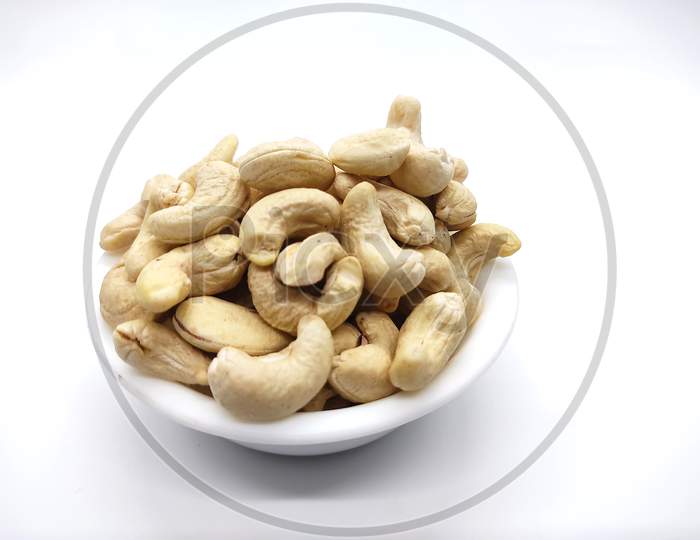 Cashew / Kaju In White Plate With Isolated White Background