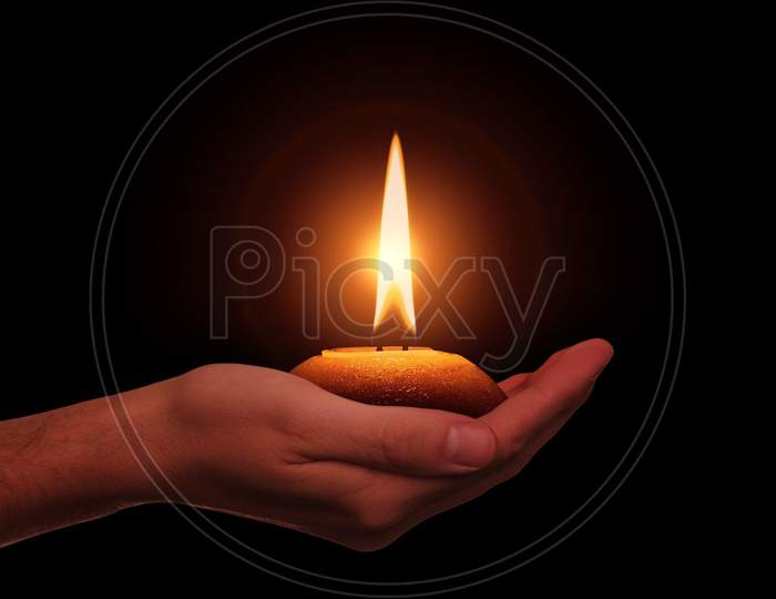 Hand candle Diwali festival