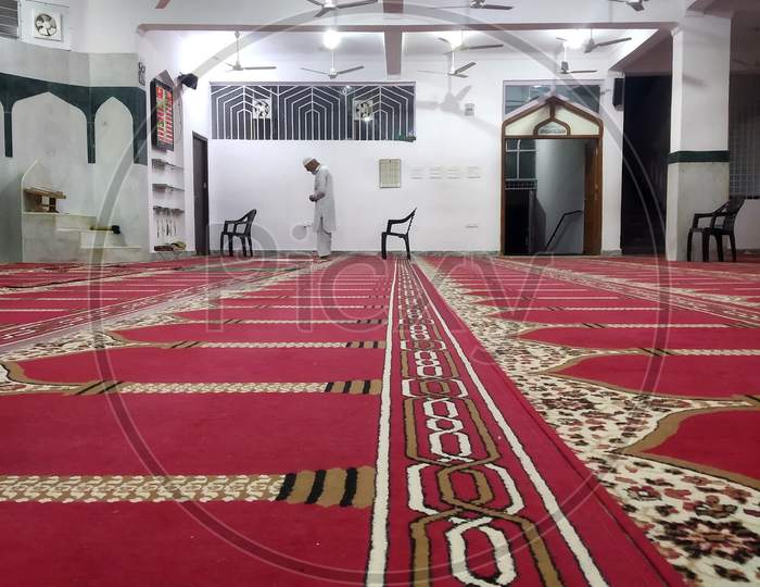 Man praying in masjid