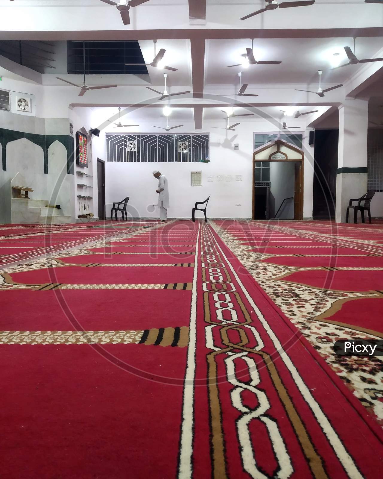 Man praying in masjid