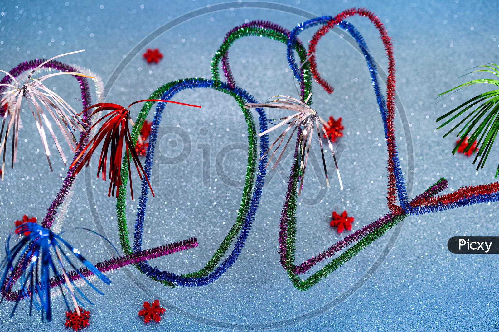2022 New Years Postcard With Festive Multicolored Pipe Cleaners.
