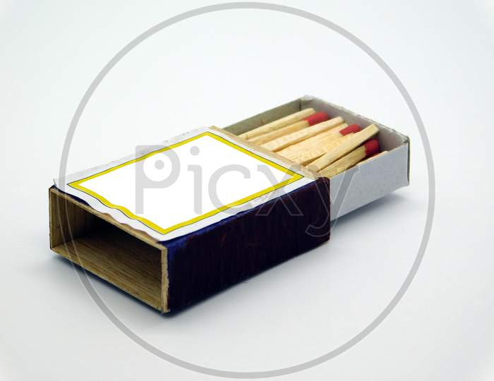 Matchstick In A Match Box On Isolated White Background