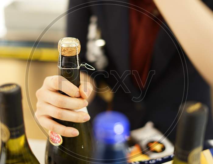 Woman With A Wine Bottle