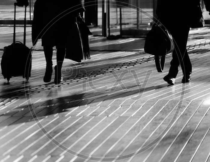Shadow Of People Walking Wood Deck