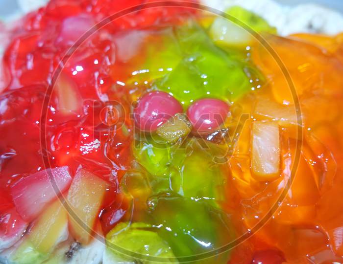 Creamy Custard Jelly Sweet Dish With Different Slices Layered On Surface