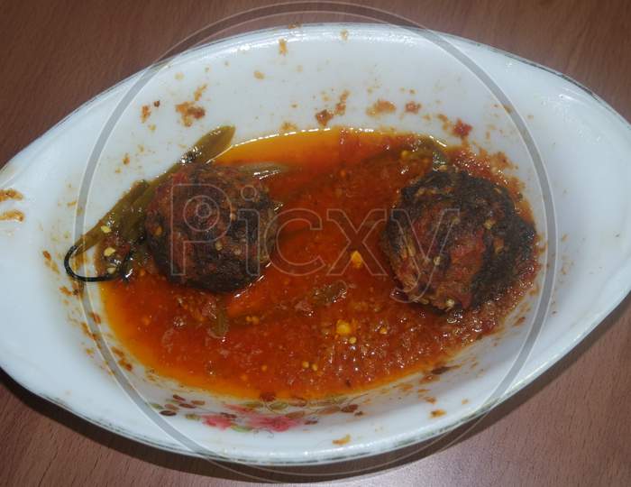 Top View Of Meat Balls Or Meat Kofta Curry In Masala Gravy In A Ceramic Plate