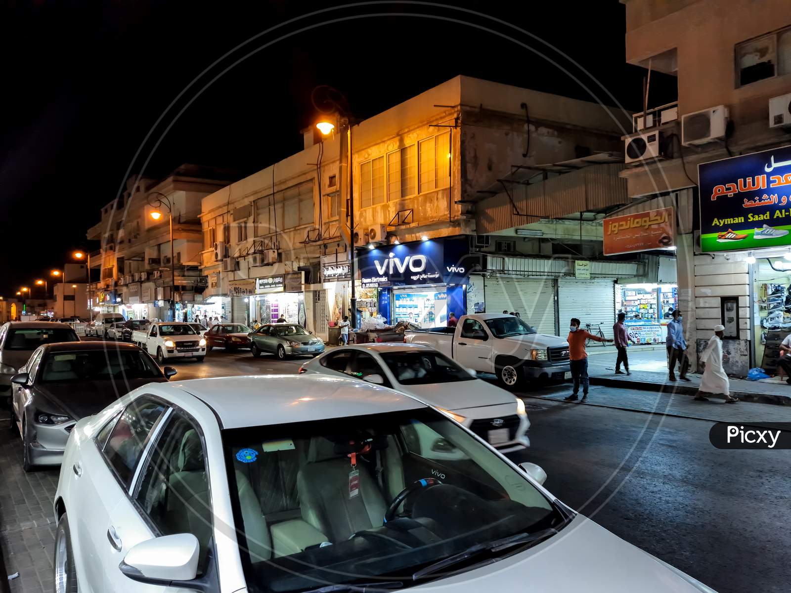 Beautiful Street and cars In Marketing Area beautiful view in night photo shoot,September,10,2021:al hasa saudi arabia.