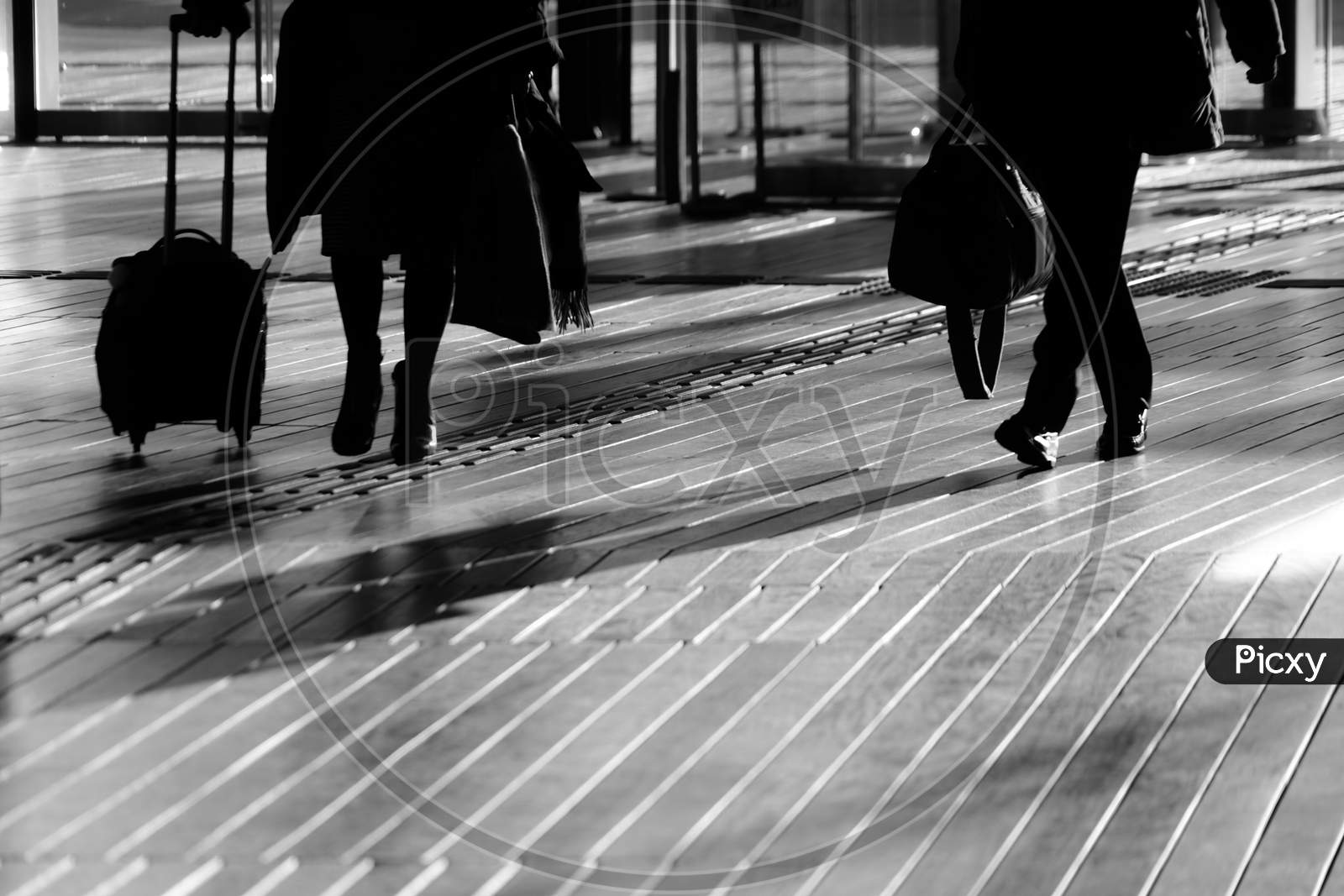 Shadow Of People Walking Wood Deck