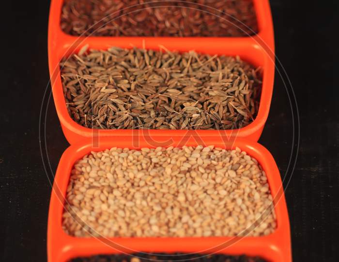 Mix Indian Spice And Grains In Oregon Plate,Fenugreek With Anise Spice,Black And White Sesame With Flex Seeds And Caraway Seeds,These Spices Used Daily With Indian Food