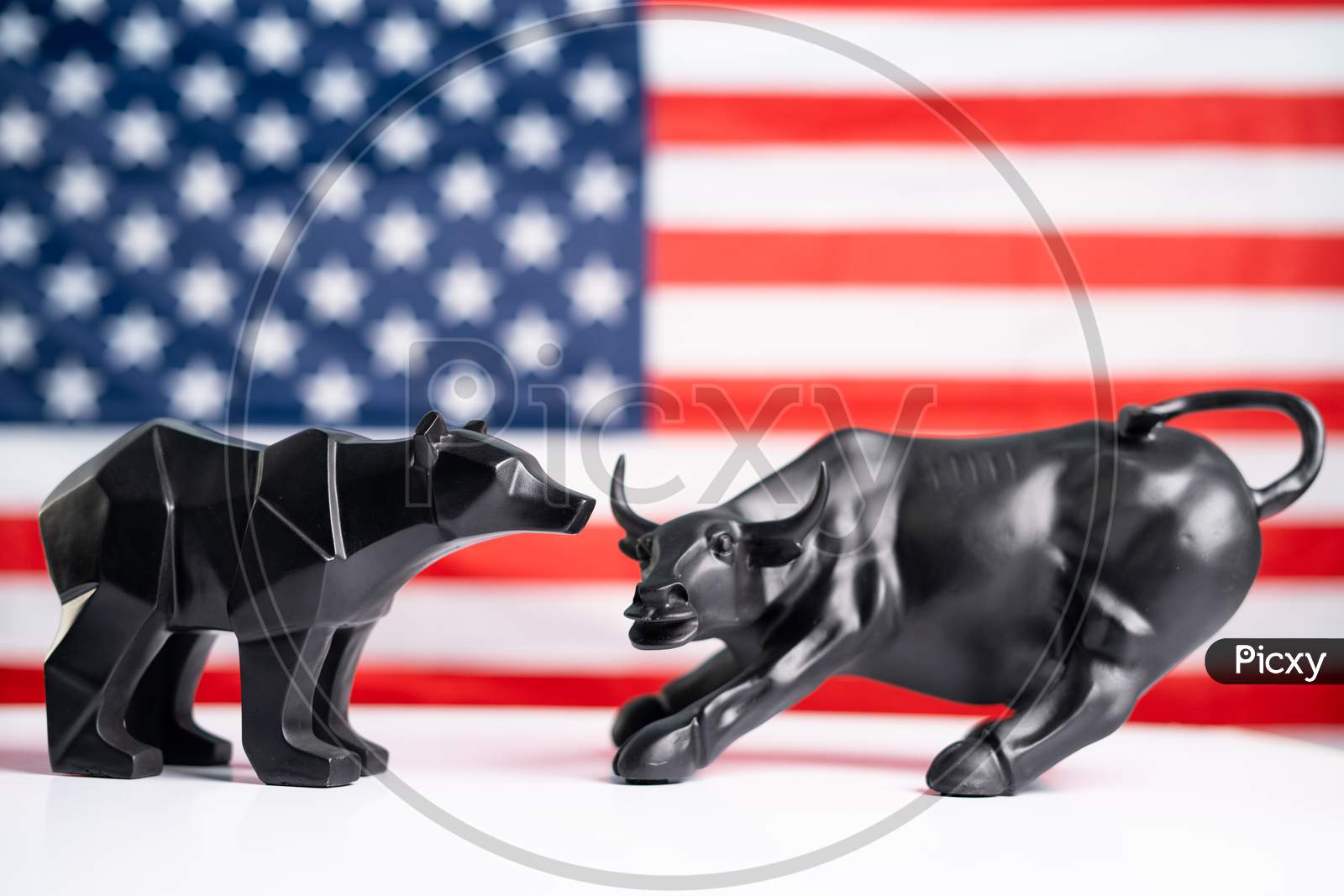 Stock Market Bull And Bear With American Flag As Background - Concept Of Investment In Us Equity Shares Market.