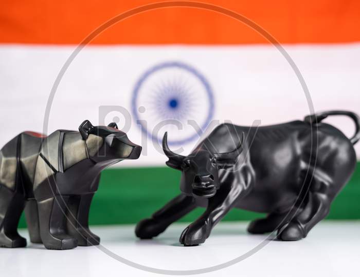 Stock Market Bull And Bear With Indian Flag As Background - Concept Of Investment In Indian Equity Sensex Share Market.