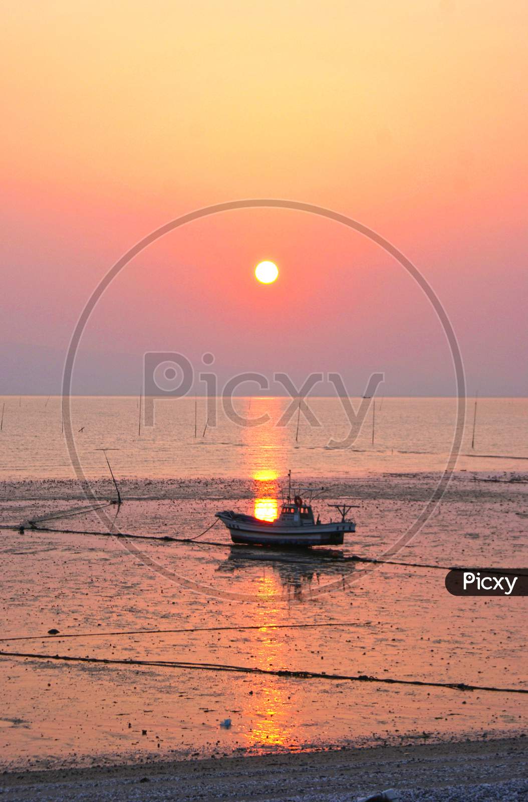 Fishing Boat And Sunset