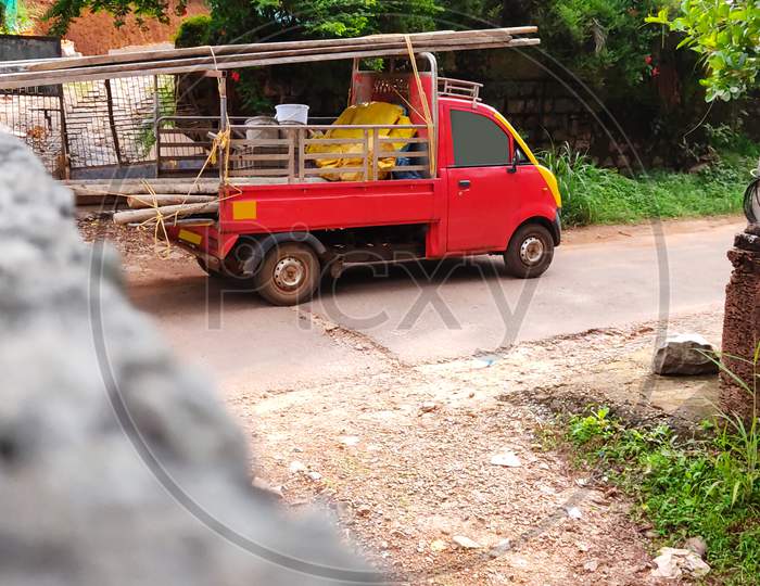 A Goods Carrying Vehicle On Road