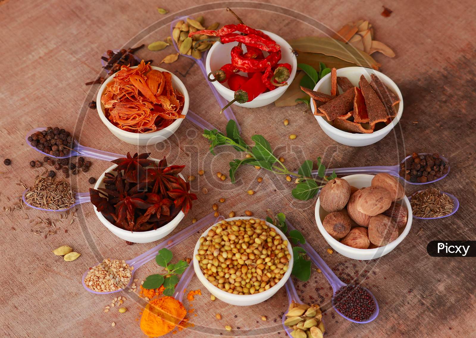 Collection Of Beautiful Indian Spices Rotated On Wooden Table,Assortment Spices And Herbs For Cooking,Food And Cuisine Ingredients,Various Spices Collection,