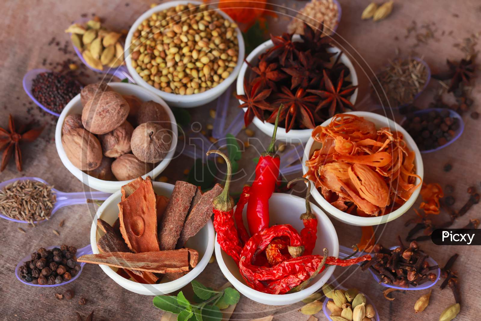 Collection Of Beautiful Indian Spices Rotated On Wooden Table,Assortment Spices And Herbs For Cooking,Food And Cuisine Ingredients,Various Spices Collection,