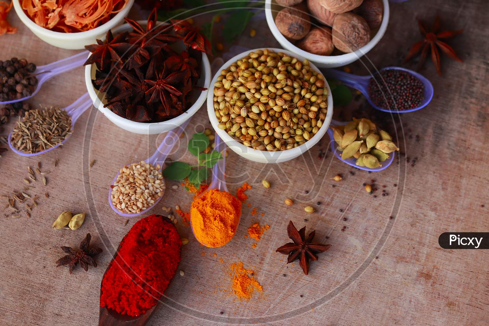 Image of Colorful Herbs And Spices For Cooking,Indian Spices,Indian Spices On Wooden Table